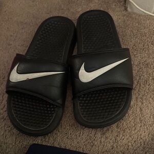 Nike Black Slides with Silver Swoosh